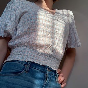 A flower patterned blouse